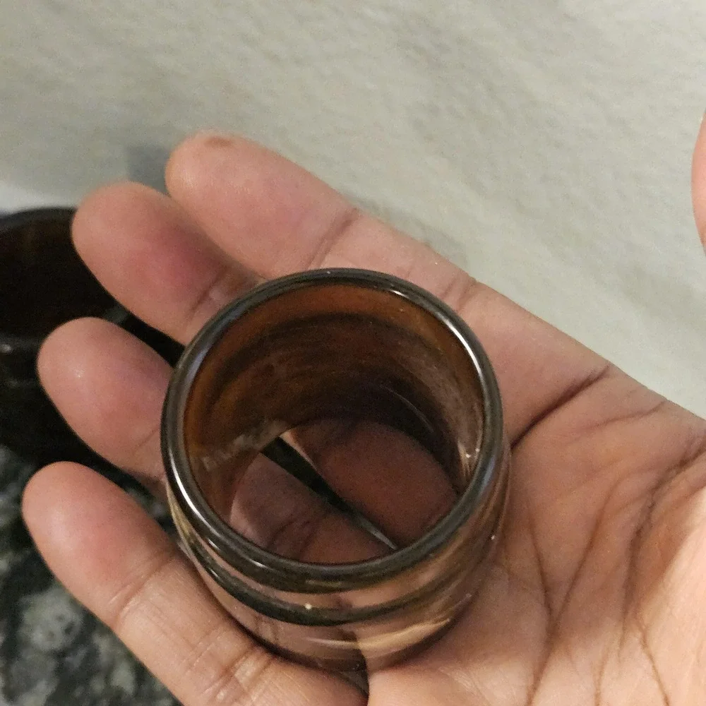 Set of 3 brown swirl like tortoise plastics or bakelite MCM‎ napkin rings